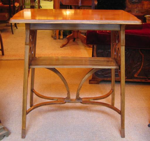 Art Nouveau walnut table.